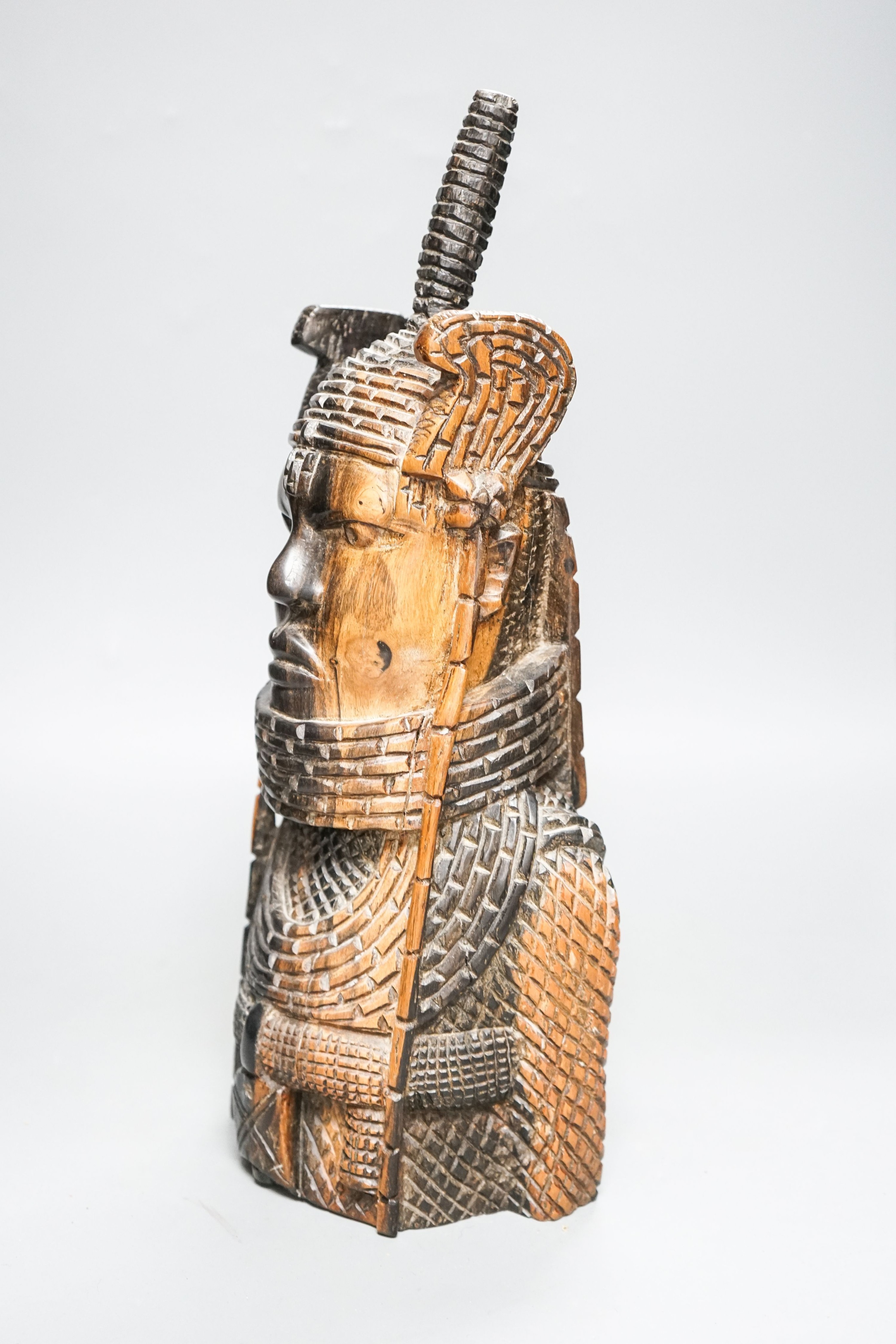 A Nigerian carved hardwood figure of KIng OBA 39cm